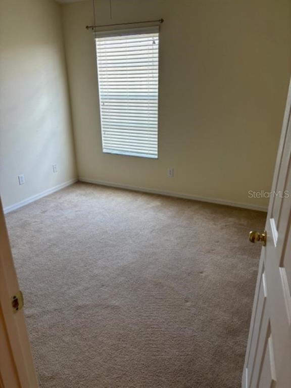 3336 Santa Rita Lane Land O Lakes, FL 34639 - Photo 39 of 60 an empty room with a window