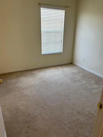 a view of large windows and an outdoor space