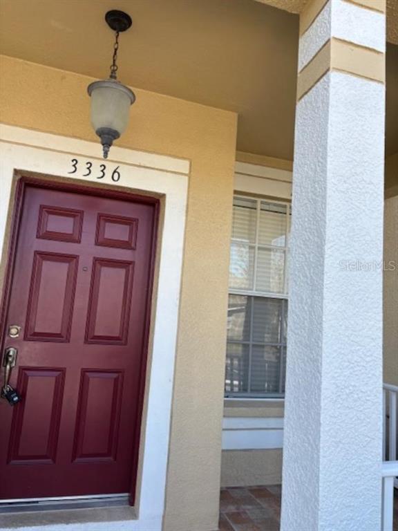 3336 Santa Rita Lane Land O Lakes, FL 34639 - Photo 4 of 60 a view of a hallway to a room