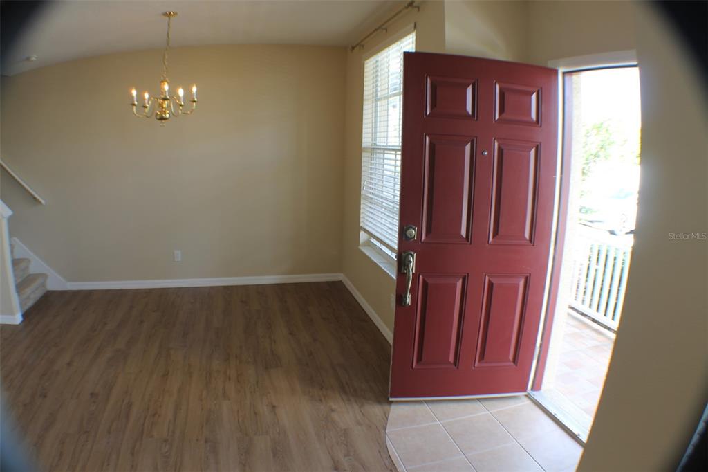 3336 Santa Rita Lane Land O Lakes, FL 34639 - Photo 8 of 60 a view of front door with hallway