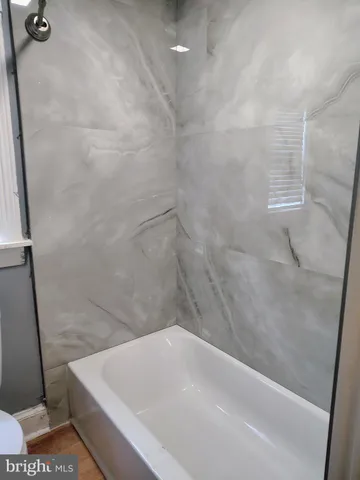 a bathroom with a bathtub