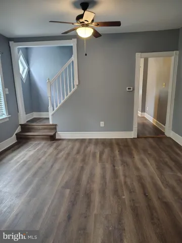 wooden floor in a hall with an entryway