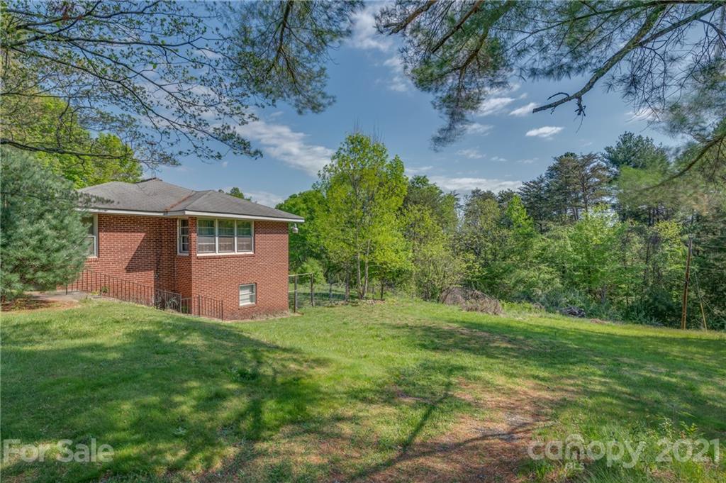 134 Chimney Rock Road Rutherfordton, NC 28139 - Photo 3 of 33 a view of a house with a yard