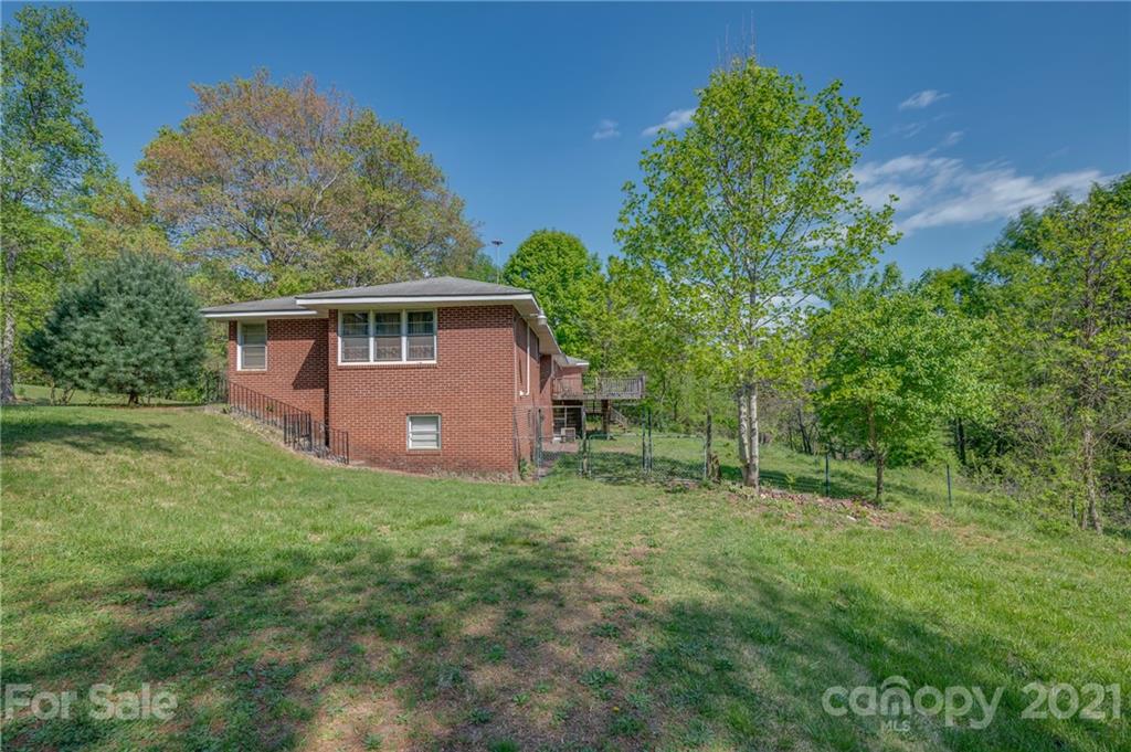 134 Chimney Rock Road Rutherfordton, NC 28139 - Photo 4 of 33 a view of a house with a yard