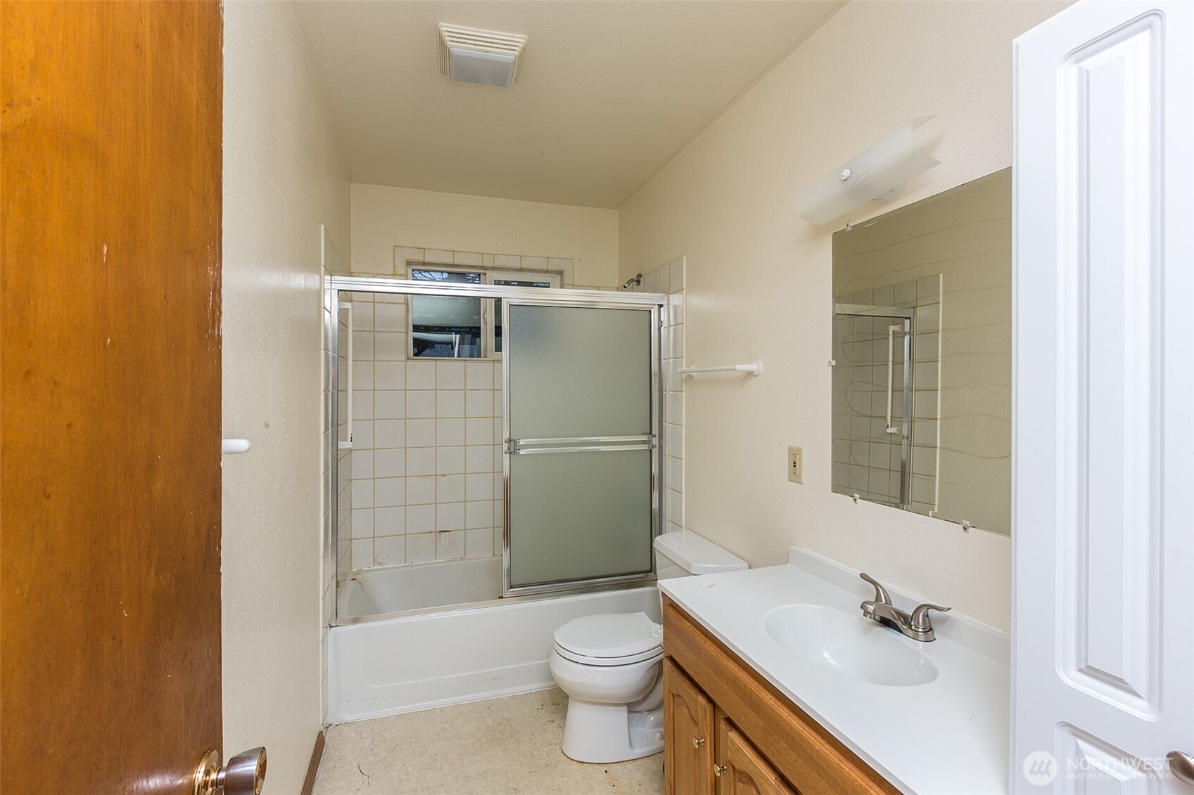 910 East 7th Street Port Angeles, WA 98362 - Photo 12 of 33 a bathroom with a sink a toilet and shower