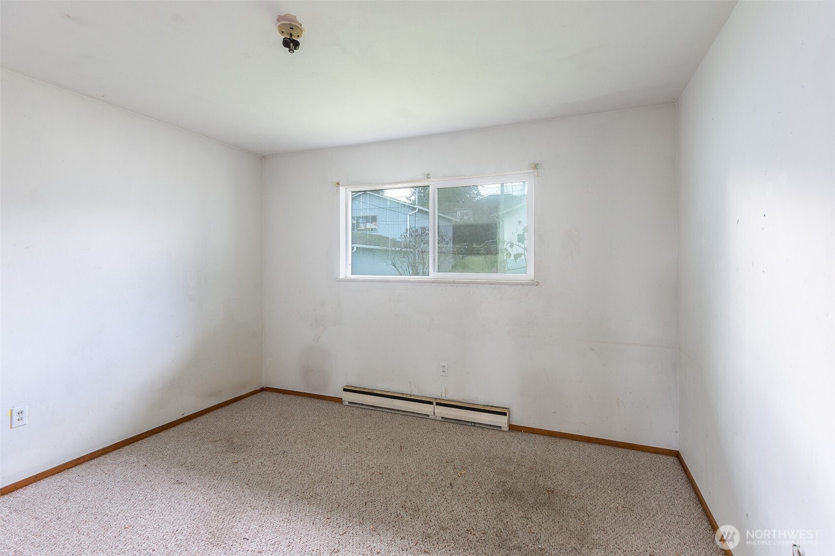 910 East 7th Street Port Angeles, WA 98362 - Photo 13 of 33 an empty room with windows
