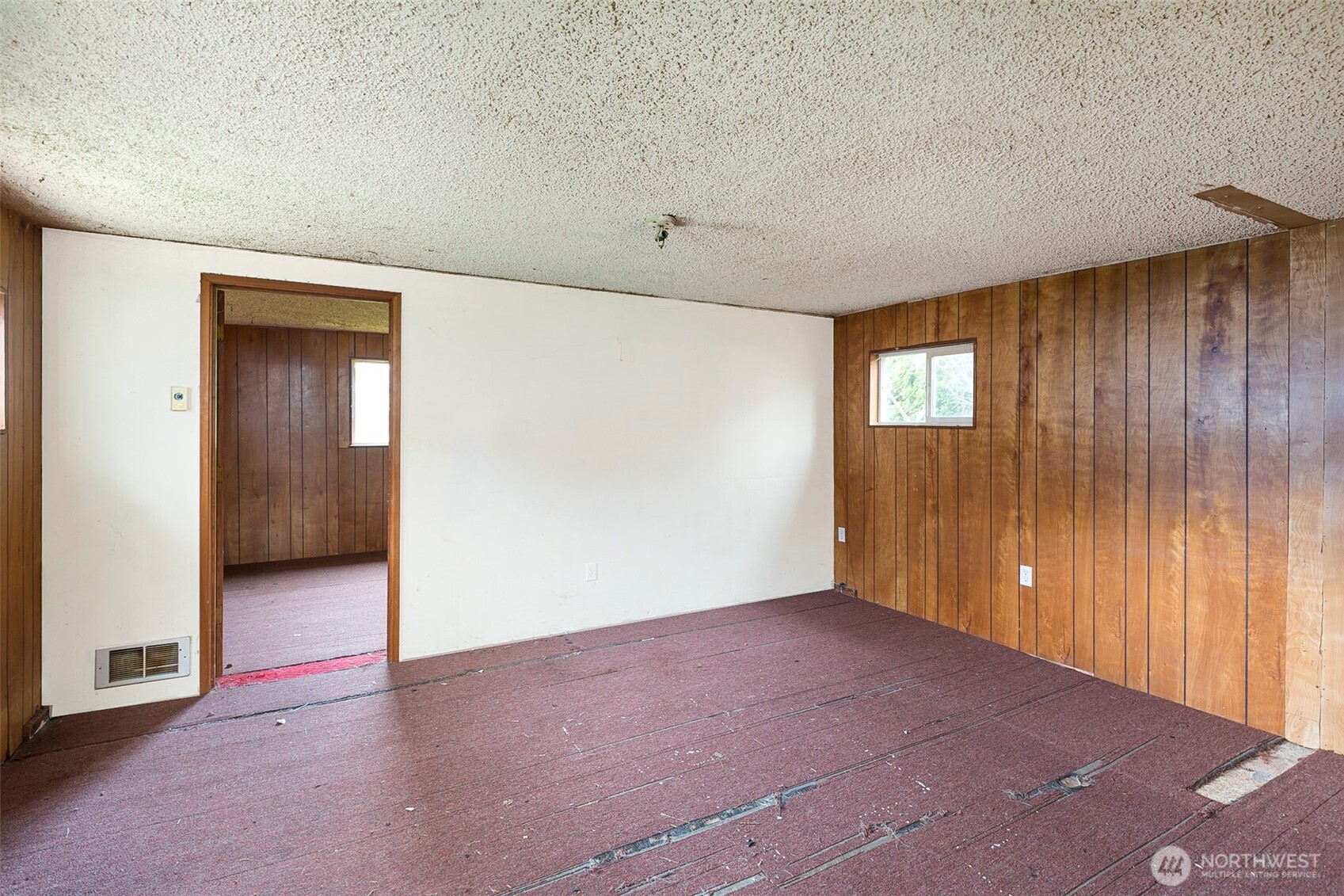 910 East 7th Street Port Angeles, WA 98362 - Photo 14 of 33 an empty room with windows