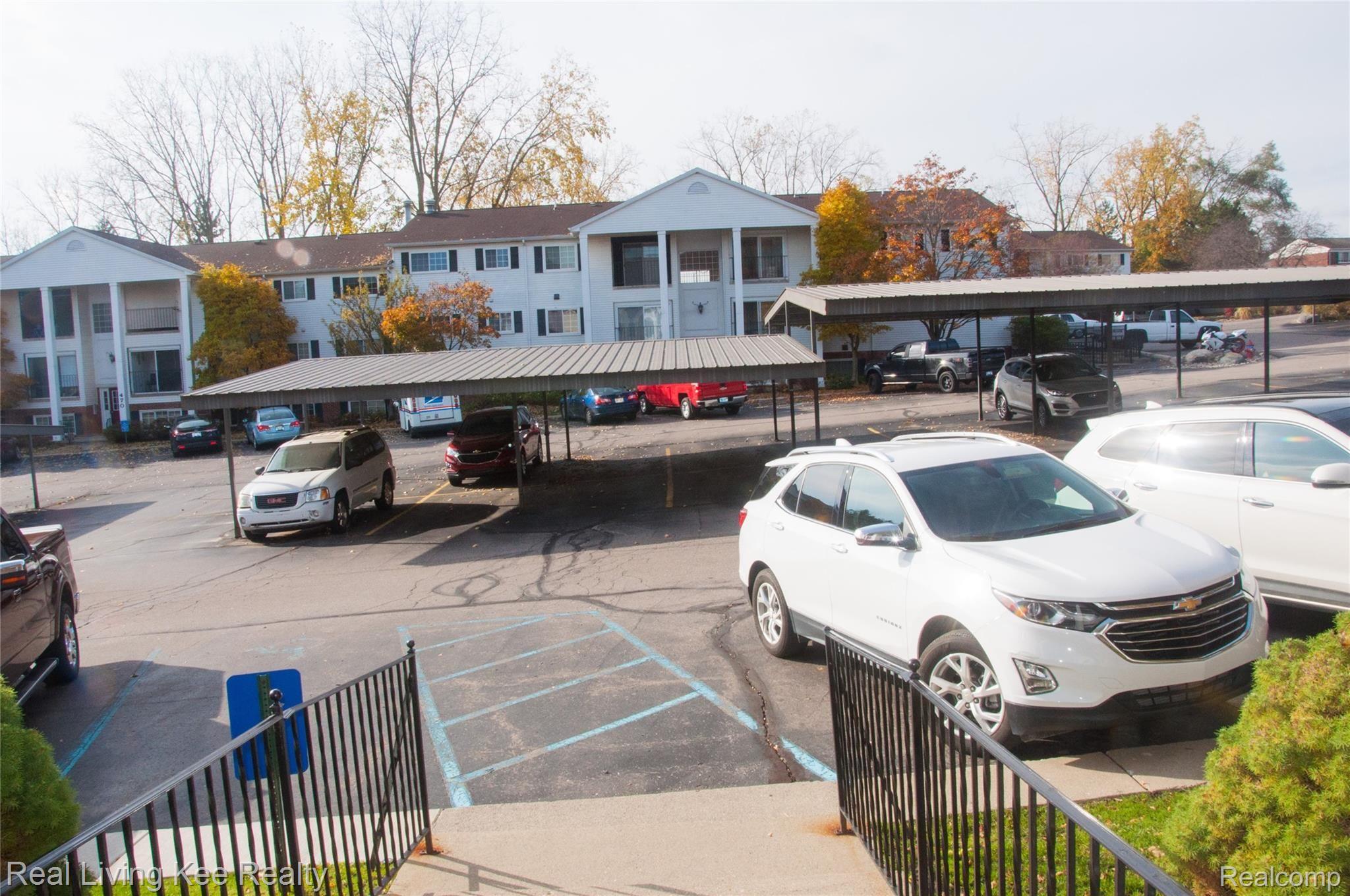 460 Baldwin Avenue, Unit 42 Rochester, MI 48307 - Photo 20 of 20 Plenty of Parking and a car port too.jpg