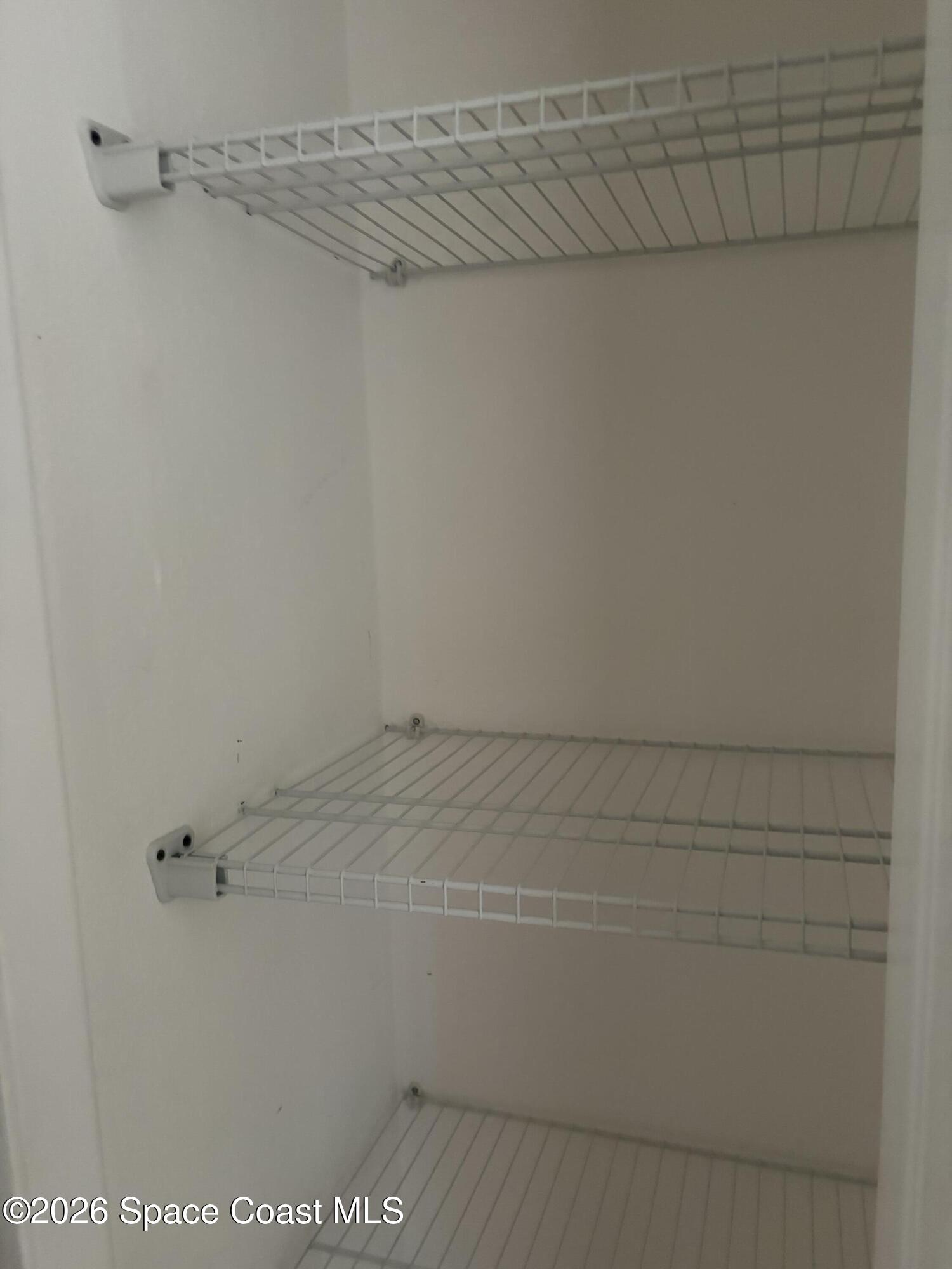 1136 Minnet Court Northeast Palm Bay, FL 32905 - Photo 6 of 31 Storage closet