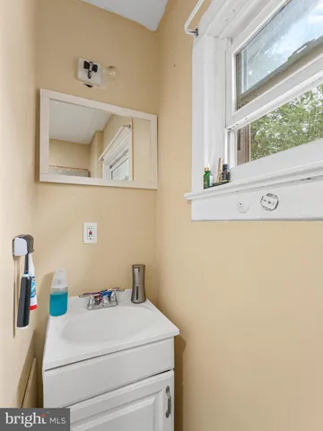 a bathroom with a sink and a vanity