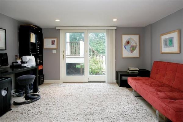 83 Peregrine Road Newton, MA 02459 - Photo 6 of 11 a living room with furniture and a large window