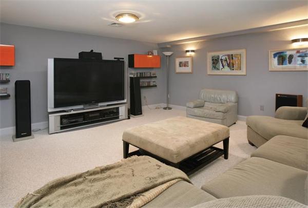 83 Peregrine Road Newton, MA 02459 - Photo 7 of 11 a living room with furniture and a flat screen tv