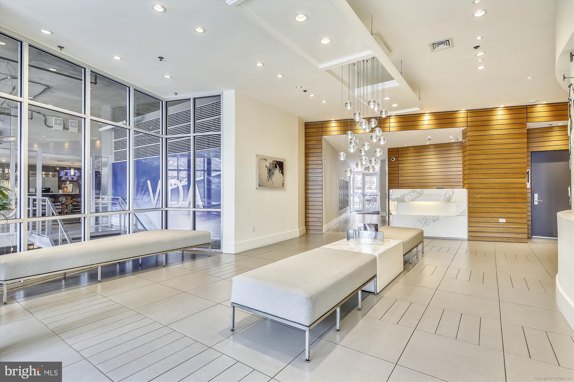 1515 15th Street Northwest, Unit 406 Washington, DC 20005 - Photo 18 of 26 a living room with a large window