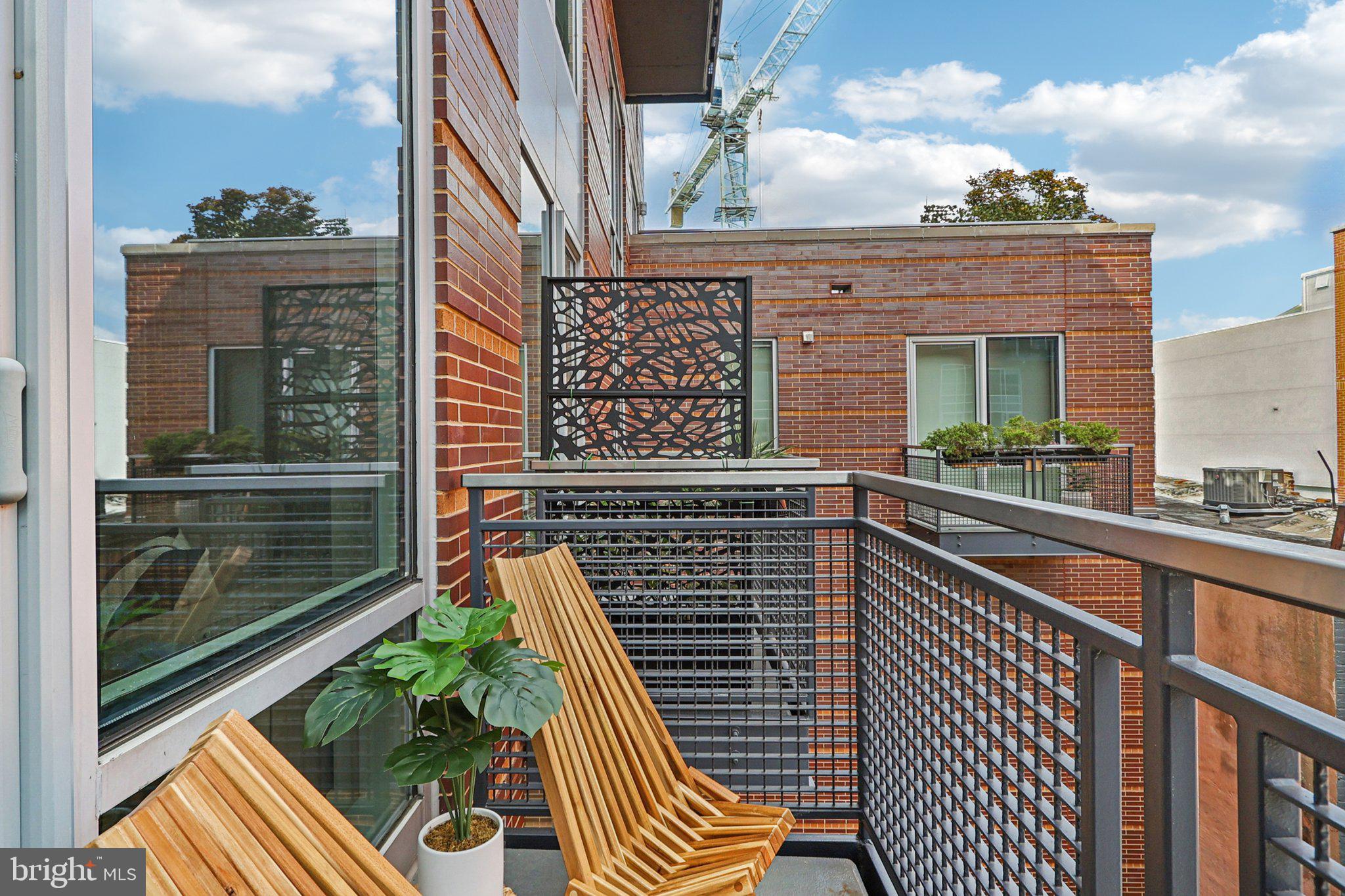 1515 15th Street Northwest, Unit 406 Washington, DC 20005 - Photo 9 of 26 a balcony with view of the ocean view
