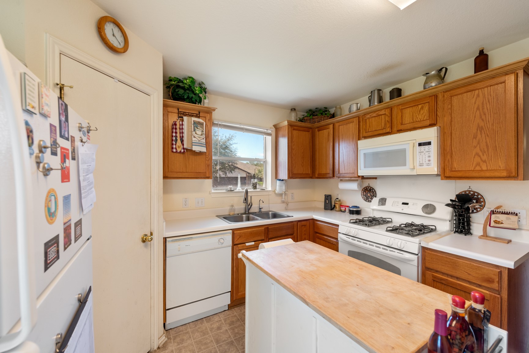5501 English Avenue Austin, TX 78724 - Photo 4 of 19 a kitchen with stainless steel appliances granite countertop a sink and cabinets