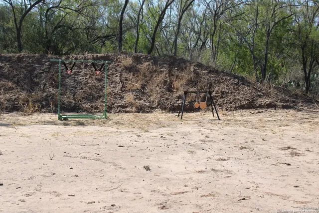 a view of a yard covered in snow