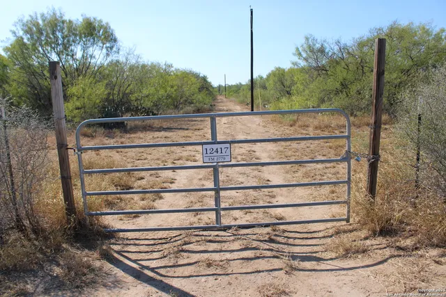 a view of a wooden fence