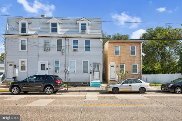 a car parked in front of a house