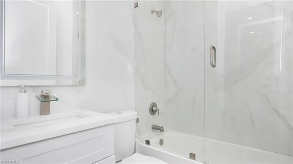 a bathroom with a sink and a bathtub