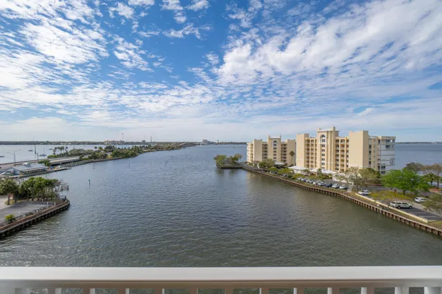 a view of a lake with a city