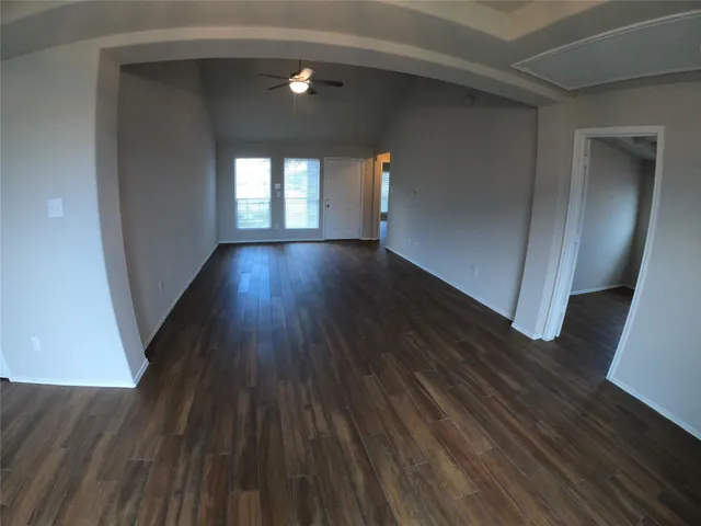 a view of gallery with wooden floor