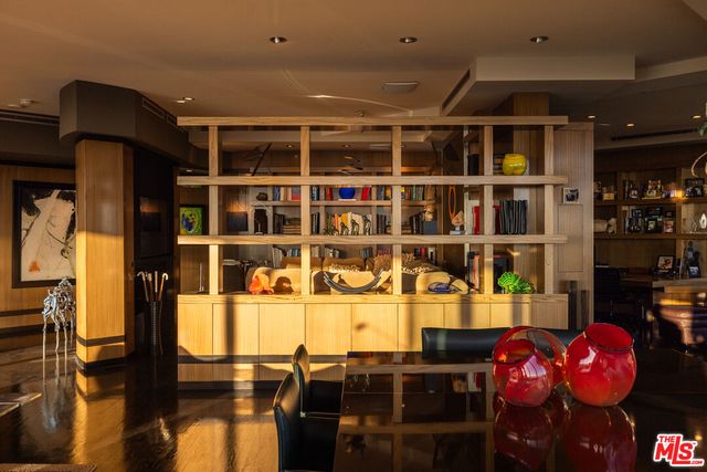 a front view of a house with many windows