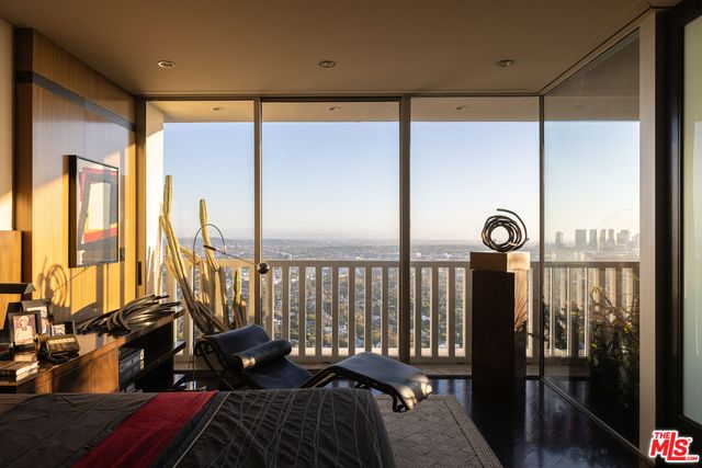 a view of a balcony with furniture