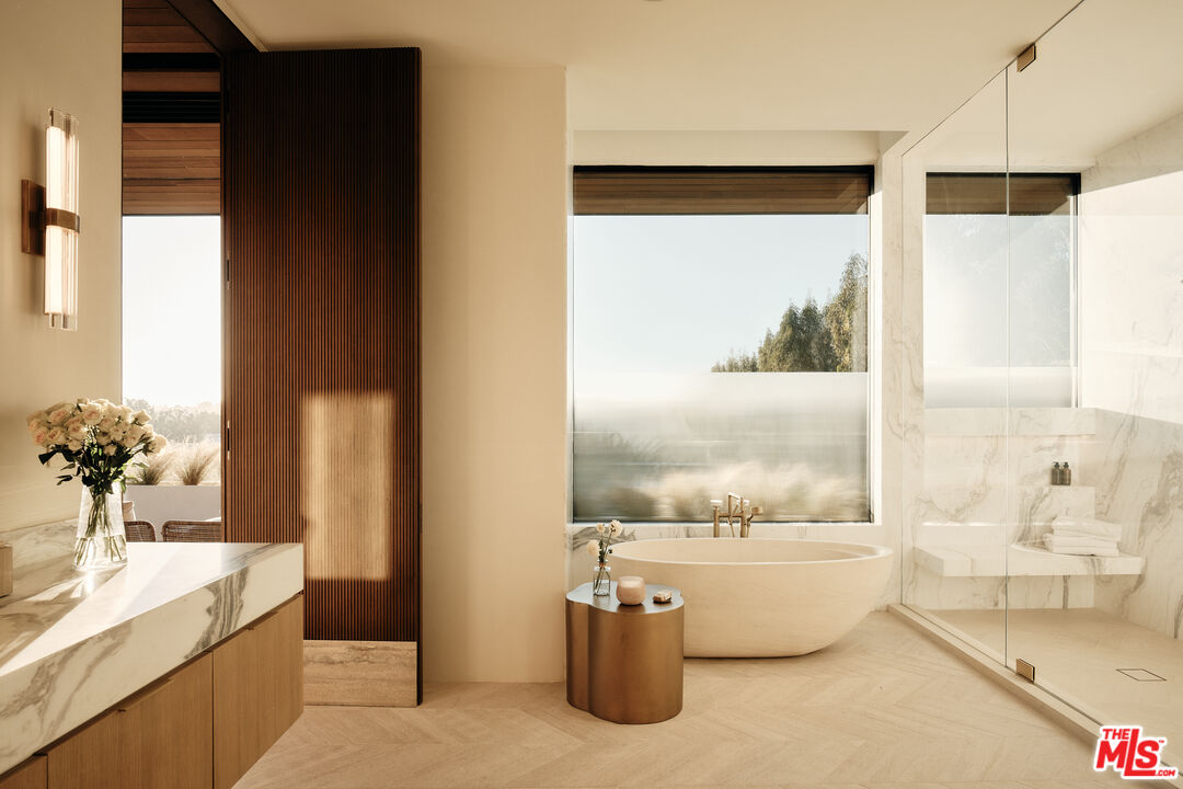 401 North Tigertail Road Los Angeles, CA 90049 - Photo 20 of 41 a living room with large windows