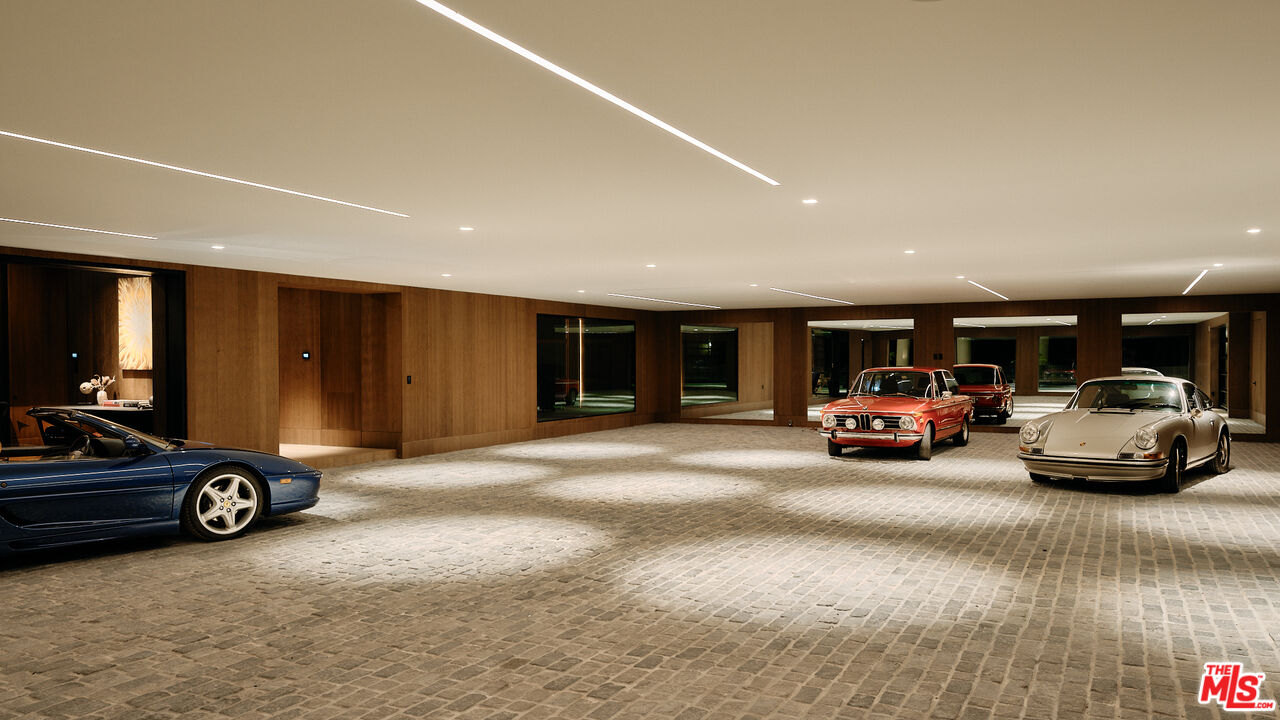 401 North Tigertail Road Los Angeles, CA 90049 - Photo 39 of 41 a car parked in parking area