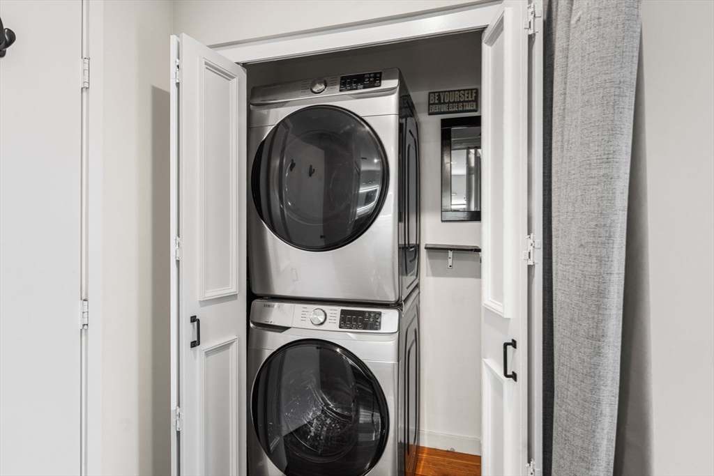32 Shipway Place, Unit 32 Boston, MA 02129 - Photo 18 of 19 a view of a hallway with washer and dryer