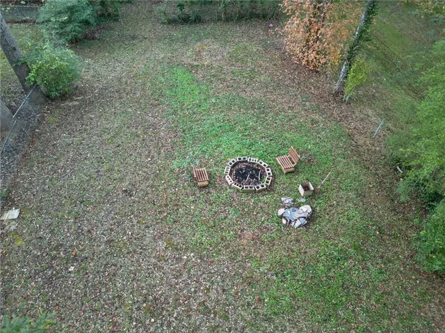 a view of a house with a back yard