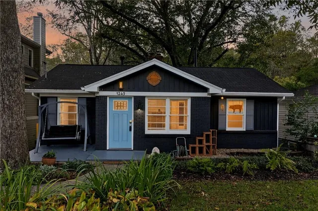 a front view of a house with yard