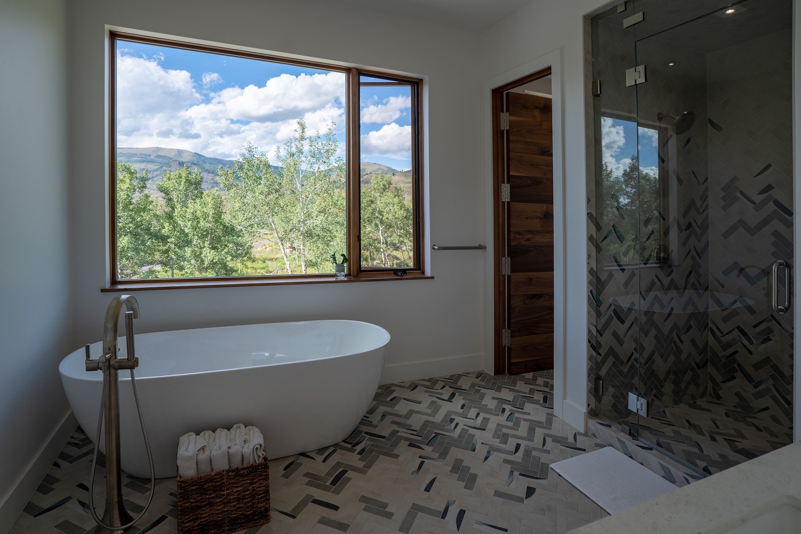 2150 Elk Run Road Silverthorne, CO 80498 - Photo 8 of 29 Bathroom featuring independent shower and bath, a healthy amount of sunlight, and tile patterned floors