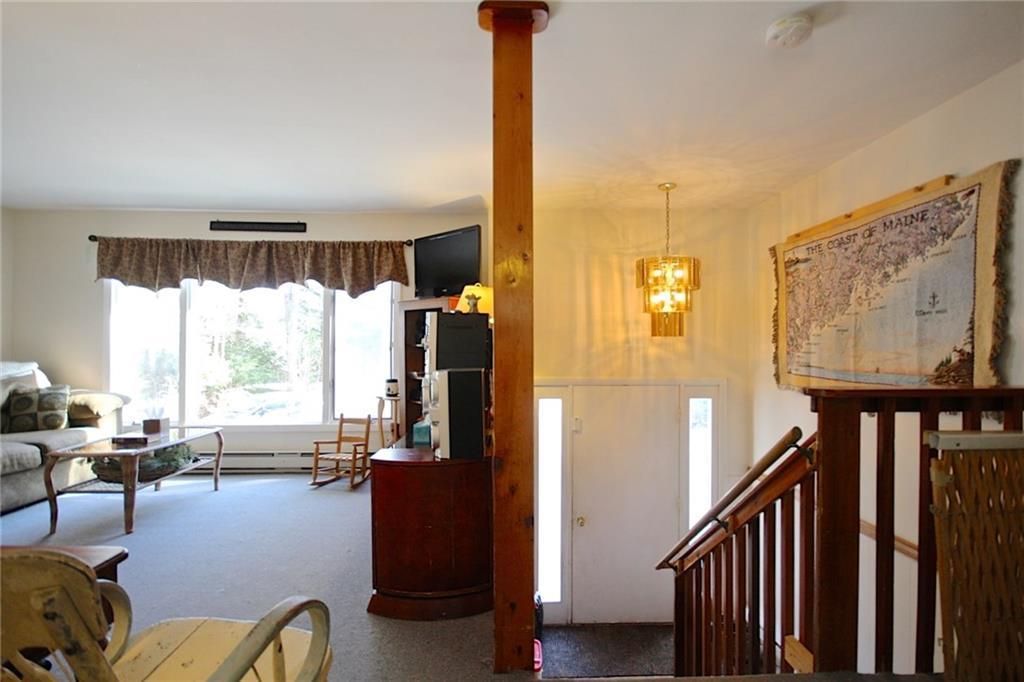 1 Wood Pond Road Brunswick, ME 04011 - Photo 12 of 31 Living room and front entry stairs.