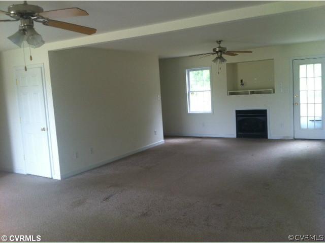 11210 Duncan Road Petersburg, VA 23805 - Photo 4 of 12 Living Room - The living room is huge and has a fi