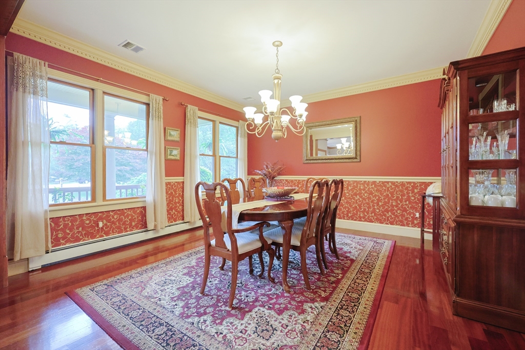 70 Azalea Way Hanson, MA 02341 - Photo 8 of 42 a view of a dining room with furniture window and wooden floor