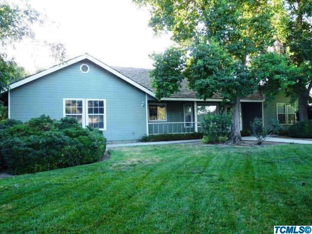 733 South Anderson Road Exeter, CA 93221 - Photo 3 of 17 a front view of house with yard and green space
