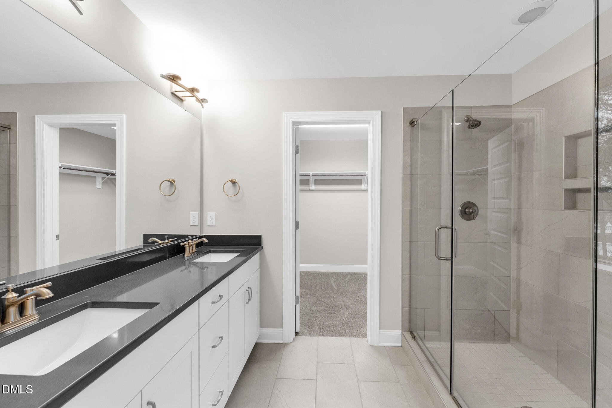 928 Barringer Drive Raleigh, NC 27606 - Photo 24 of 40 a spacious bathroom with a granite countertop sink mirror and shower