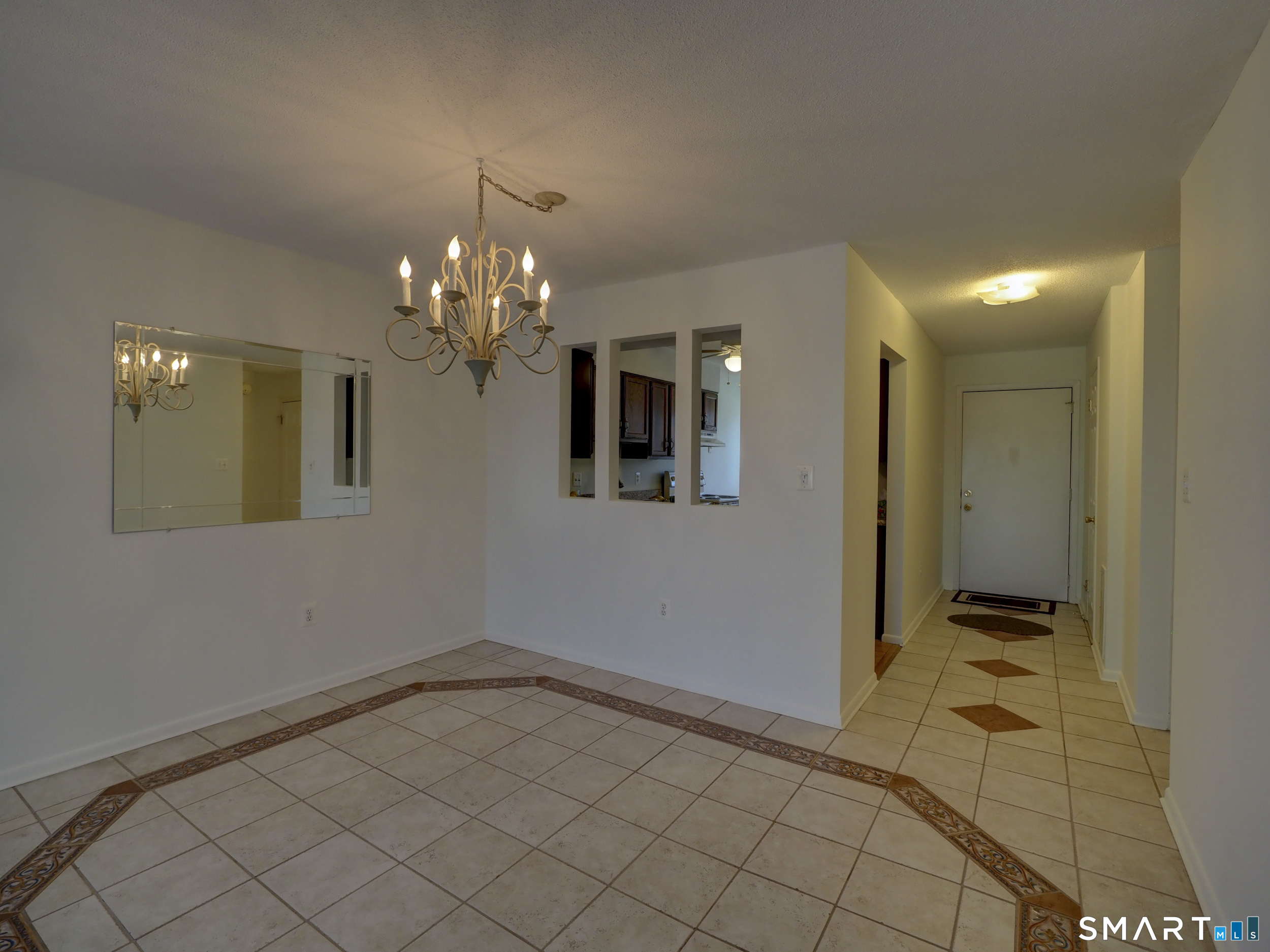 412 Pilgrims Harbor, Unit 412 Wallingford, CT 06492 - Photo 9 of 22 a view of livingroom with hallway