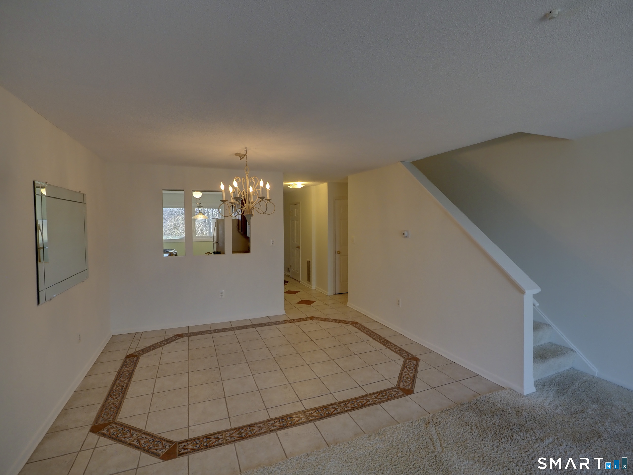 412 Pilgrims Harbor, Unit 412 Wallingford, CT 06492 - Photo 10 of 22 a view of an empty room