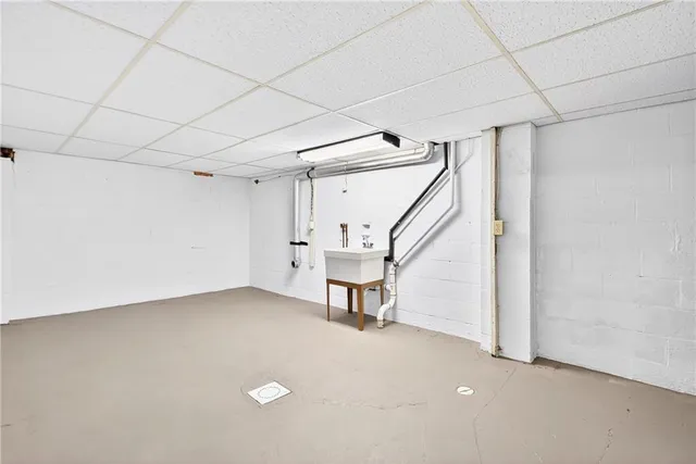 a view of an empty room with stairs