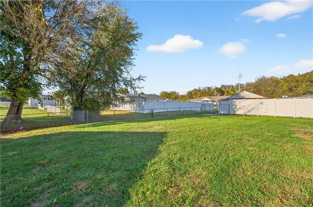 a view of an outdoor space and a yard