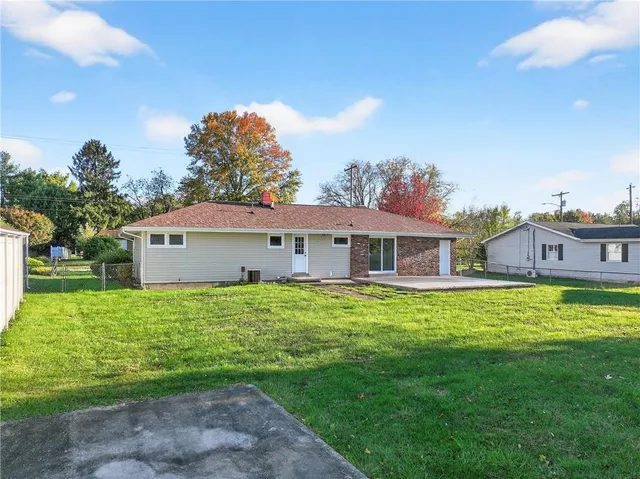 a house view with a garden space