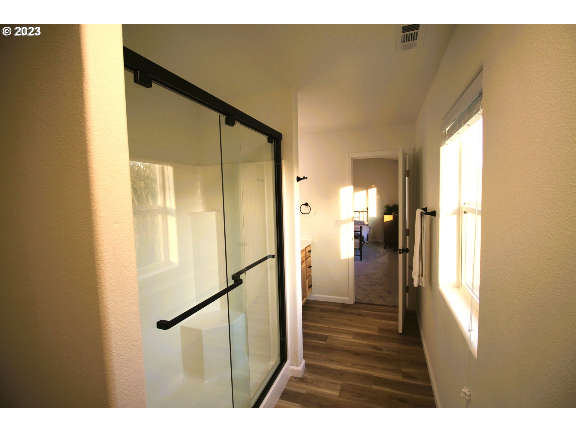 3864 Aerial Way Eugene, OR 97402 - Photo 12 of 22 a view of hallway with wooden floor
