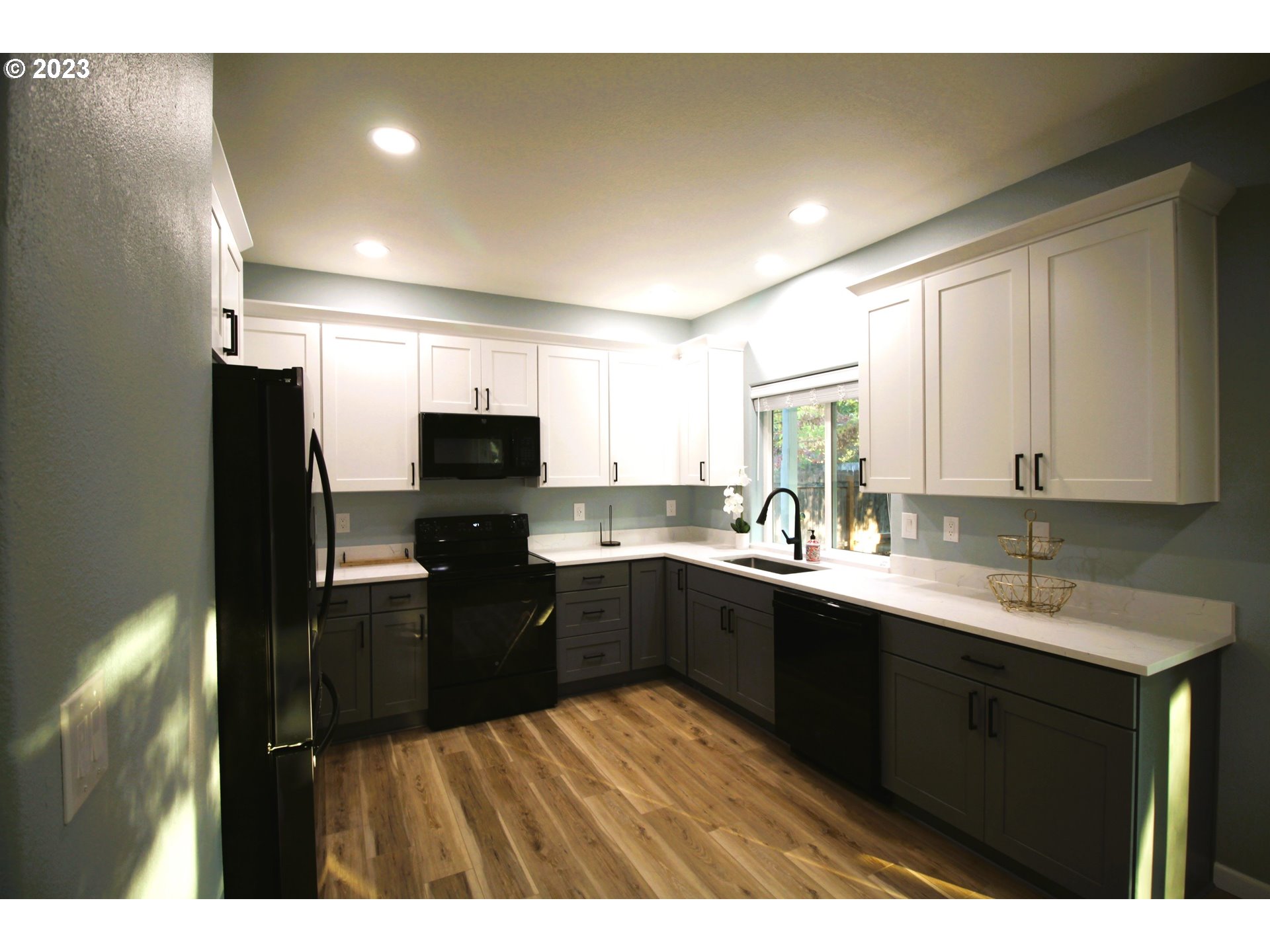 3864 Aerial Way Eugene, OR 97402 - Photo 8 of 22 a kitchen with a sink and cabinets