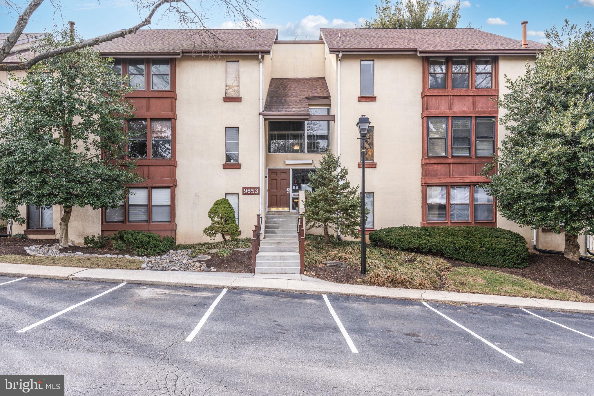 9653 White Acre Road, Unit B2 Columbia, MD 21045 - Photo 1 of 28 a front view of a building