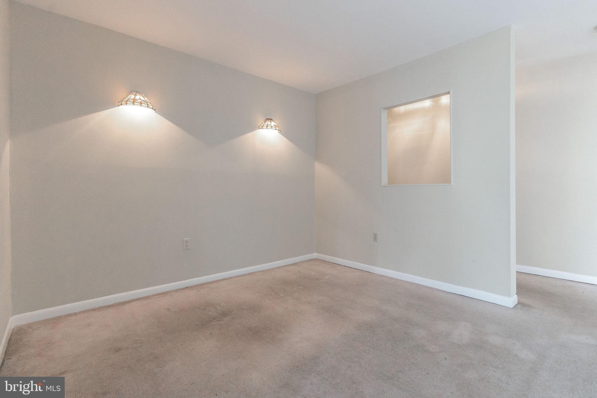 9653 White Acre Road, Unit B2 Columbia, MD 21045 - Photo 12 of 28 a view of an empty room and window