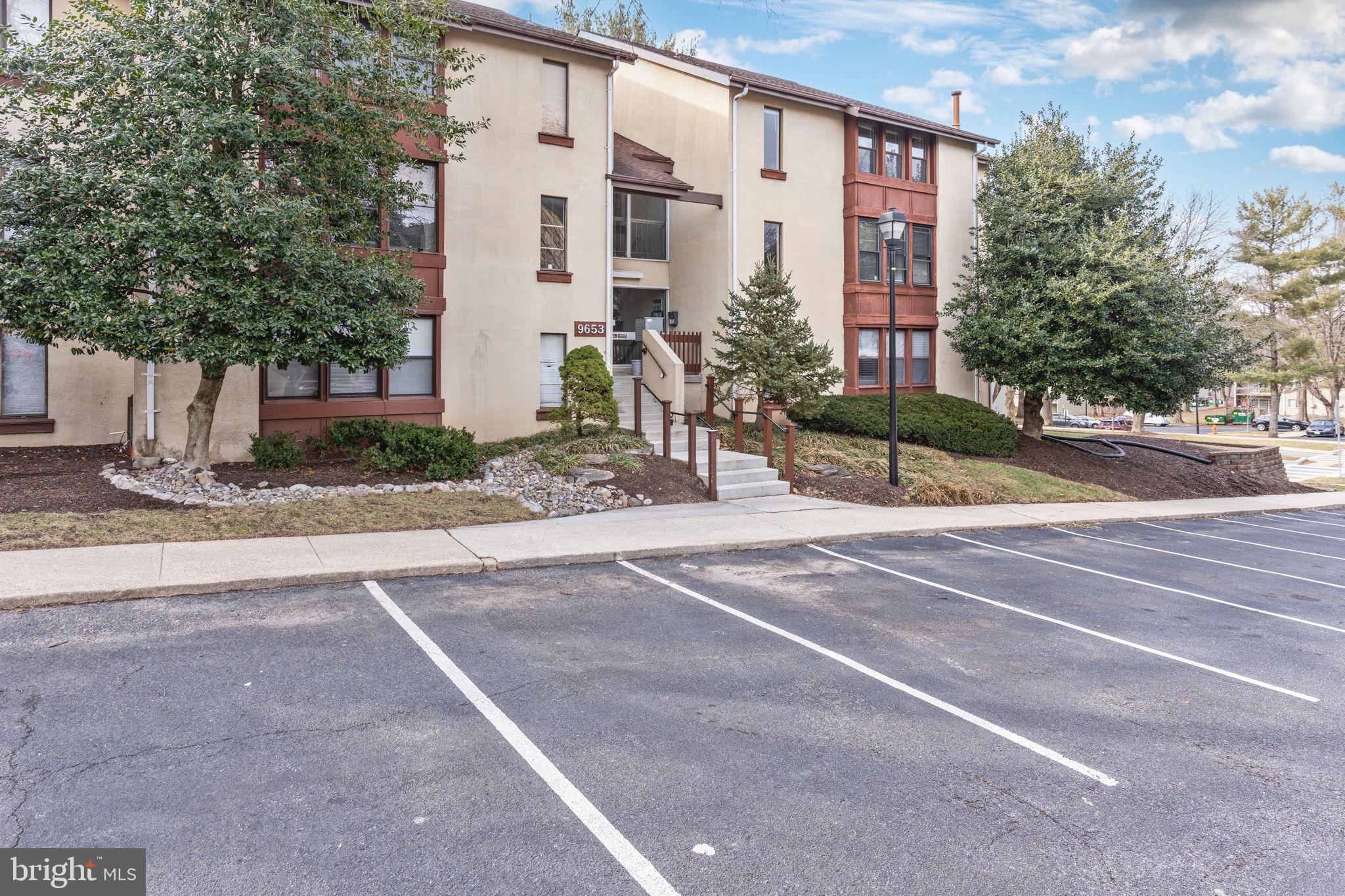 9653 White Acre Road, Unit B2 Columbia, MD 21045 - Photo 2 of 28 a view of a building with a street