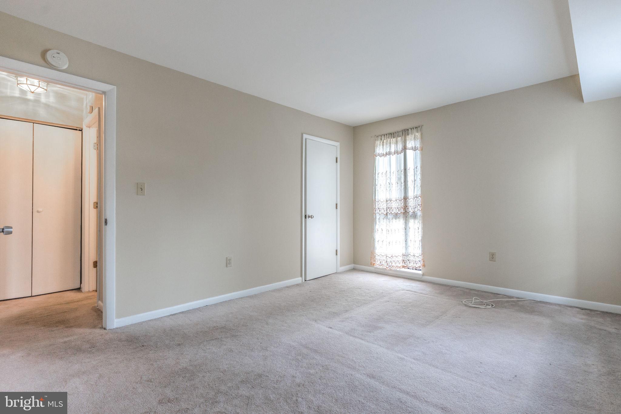 9653 White Acre Road, Unit B2 Columbia, MD 21045 - Photo 25 of 28 a view of an empty room with window