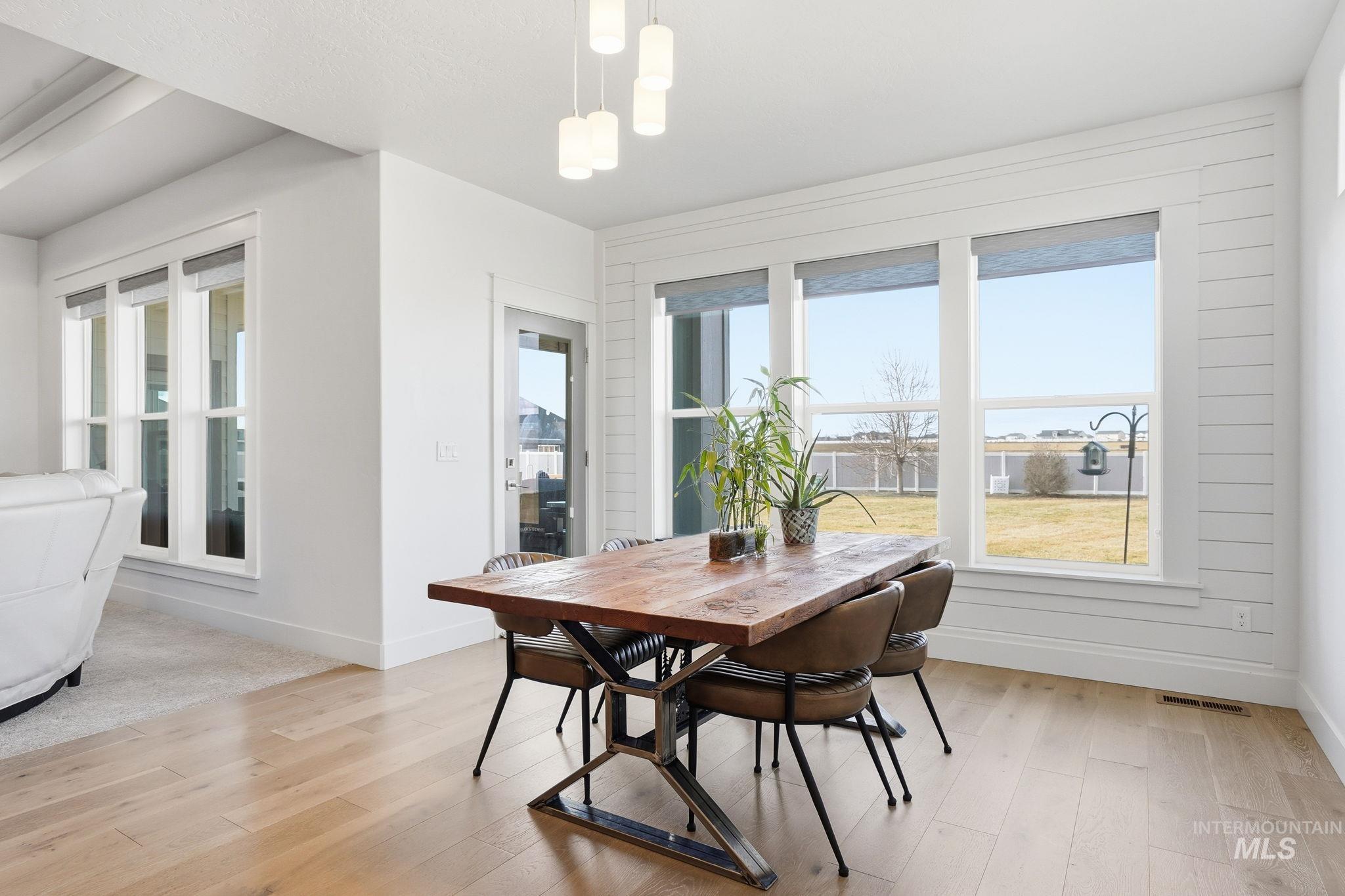 2301 Nordic Avenue Middleton, ID 83644 - Photo 15 of 50 Dining area with baseboards and light wood-style flooring